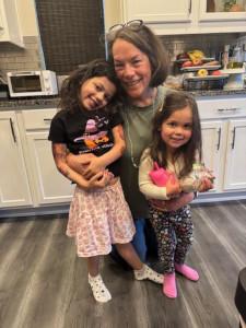 Boo at home in the kitchen with her two kids
